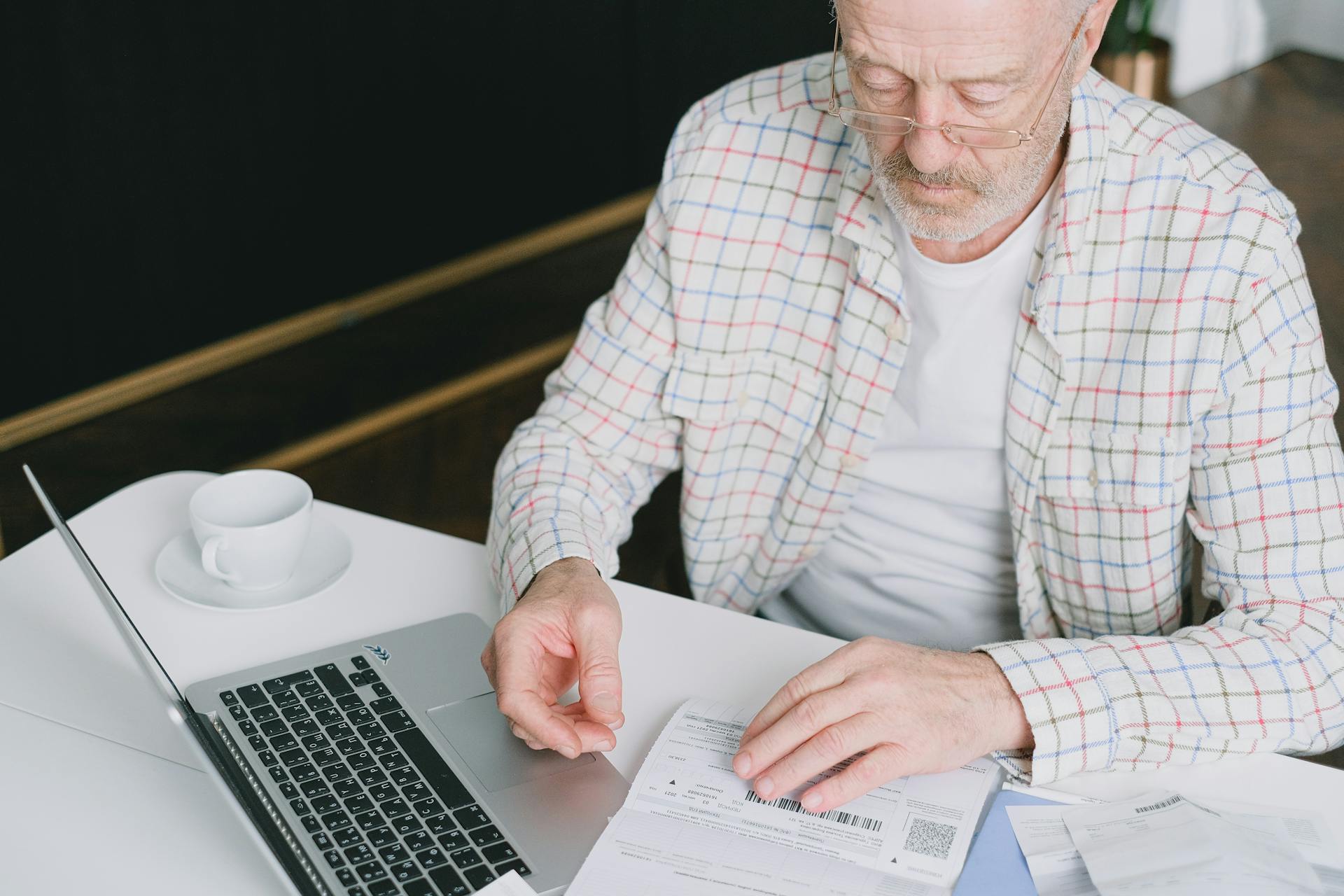 senior looking at documents